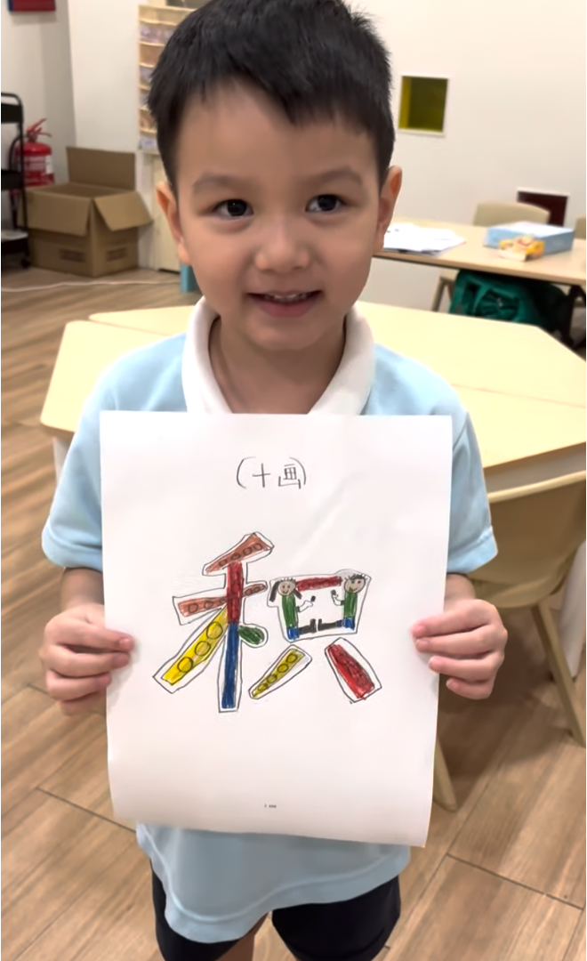 A child writing at a desk during the supervised homework and learning club at Belle & Russell